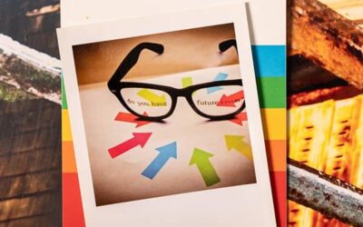 Photo Polaroid de lunettes noires et flèches colorées.