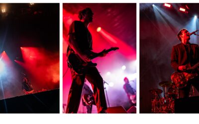 Groupe de rock en concert, éclairage rouge spectaculaire.